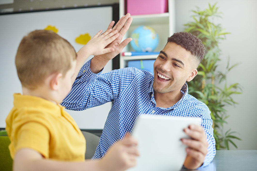 schoolboy with trainee teacher